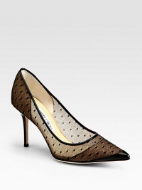 Polka-dot mesh upper complemented by a lacquered heel, point toe and patent leather toecap. Lacquered heel, 3½ (90mm)Mesh and patent leather upperPoint toeLeather lining and solePadded insoleMade in Italy Polka-dot mesh upper complemented by a lacquered heel, point toe and patent leather toecap. Lacquered heel, 3½ (90mm)Mesh and patent leather upperPoint toeLeather lining and solePadded insoleMade in Italy