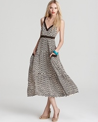 Stand out this summer in a zigzag-print MARC BY MARC JACOBS maxi dress featuring a deep v neckline and large patch pockets, ensuring style essentials are always close at hand. Stand out this summer in a zigzag-print MARC BY MARC JACOBS maxi dress featuring a deep v neckline and large patch pockets, ensuring style essentials are always close at hand.