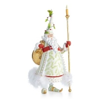 Dressed in dramatic white, green and gold, Candlelight Santa by Patience Brewster has a garland wrapped hat and a candle in his staff. His golden bag is packed with toys for the midnight ride. Dressed in dramatic white, green and gold, Candlelight Santa by Patience Brewster has a garland wrapped hat and a candle in his staff. His golden bag is packed with toys for the midnight ride.