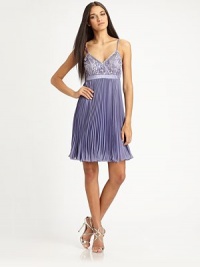 Sparkling beading and crisp allover pleats make up this sweet babydoll silhouette.Sweetheart necklineSpaghetti strapsBeaded bodice and empire waistbandPleated skirtConcealed side zipFully linedAbout 20 from natural waist80% polyester/20% nylonSpot cleanImportedModel shown is 5'10½ (179cm) wearing US size 4. Sparkling beading and crisp allover pleats make up this sweet babydoll silhouette.Sweetheart necklineSpaghetti strapsBeaded bodice and empire waistbandPleated skirtConcealed side zipFully linedAbout 20 from natural waist80% polyester/20% nylonSpot cleanImportedModel shown is 5'10½ (179cm) wearing US size 4.