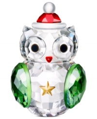 A holiday hoot, the rocking owl figurine sways gently from side to side in faceted Swarovski crystal. Green wings, a red hat and golden star make it extra irresistible. A holiday hoot, the rocking owl figurine sways gently from side to side in faceted Swarovski crystal. Green wings, a red hat and golden star make it extra irresistible.