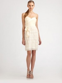Straight-across, scalloped, and lacy tiers make up the skirt of this strapless, romantic silk style.Strapless sweetheart necklineRuched cross-front bodiceWaist tieAlternating chiffon and lace tiersConcealed back zipFully linedAbout 21 from natural waistSilkDry cleanImportedModel shown is 5'10 (177cm) wearing US size 4. Straight-across, scalloped, and lacy tiers make up the skirt of this strapless, romantic silk style.Strapless sweetheart necklineRuched cross-front bodiceWaist tieAlternating chiffon and lace tiersConcealed back zipFully linedAbout 21 from natural waistSilkDry cleanImportedModel shown is 5'10 (177cm) wearing US size 4.