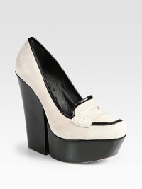 Traditional suede loafer has a modern block heel, platform and contrasting patent leather trim. Stacked heel, 5½ (140mm)Stacked platform, 1 (25mm)Compares to a 4½ heel (115mm)Suede and patent leather upperLeather lining and solePadded insoleImportedOUR FIT MODEL RECOMMENDS ordering one size up as this style runs small. Traditional suede loafer has a modern block heel, platform and contrasting patent leather trim. Stacked heel, 5½ (140mm)Stacked platform, 1 (25mm)Compares to a 4½ heel (115mm)Suede and patent leather upperLeather lining and solePadded insoleImportedOUR FIT MODEL RECOMMENDS ordering one size up as this style runs small.