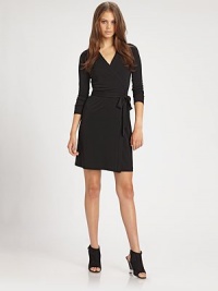 Lightweight wrap with collar and deep, v-neckline. Self tie at waist About 25 from natural waist 85% viscose/15% polyamide; dry clean Made in USAOUR FIT MODEL RECOMMENDS ordering true size. Lightweight wrap with collar and deep, v-neckline. Self tie at waist About 25 from natural waist 85% viscose/15% polyamide; dry clean Made in USAOUR FIT MODEL RECOMMENDS ordering true size.