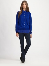 Layered chic in this featherweight viscose knit trimmed with a mock shirttail hem and point collar.Button-down frontLong sleevesRibbed trimAbout 23 from shoulder to hemViscoseDry cleanImportedModel shown is 5'9 (175cm) wearing US size Small.