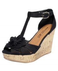 The feminine t-strap on Madden Girl's Kalasso platform wedges get even prettier thanks to the frilly bow detail on the vamp. The feminine t-strap on Madden Girl's Kalasso platform wedges get even prettier thanks to the frilly bow detail on the vamp.