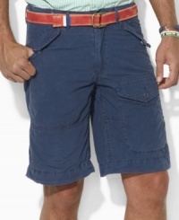 A button-flap cargo pocket at the leg lends rugged appeal to a preppy short in comfortable cotton poplin. A button-flap cargo pocket at the leg lends rugged appeal to a preppy short in comfortable cotton poplin.