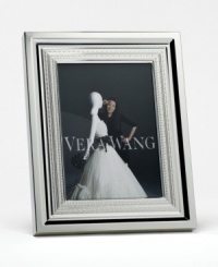 A sensuous blend of vintage-inspired frills create beautiful depth in this frame. In high-luster silverplate, this elegant home accent is fit for framing all your finest memories. A sensuous blend of vintage-inspired frills create beautiful depth in this frame. In high-luster silverplate, this elegant home accent is fit for framing all your finest memories.