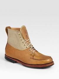 Rugged, with a touch of refinement, in smooth leather with canvas upper, highlighting super craftsmanship.Leather/canvas upperLeather liningPadded insoleRubber soleImported Rugged, with a touch of refinement, in smooth leather with canvas upper, highlighting super craftsmanship.Leather/canvas upperLeather liningPadded insoleRubber soleImported