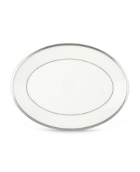 Beautiful in its simplicity, this dinnerware collection features a timeless, elegant design. The pristine white bone china is accented by a single, shimmering band of platinum. The understated beauty will add a refined sophistication to your dining experience for years to come. Beautiful in its simplicity, this dinnerware collection features a timeless, elegant design. The pristine white bone china is accented by a single, shimmering band of platinum. The understated beauty will add a refined sophistication to your dining experience for years to come.