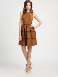 Metallic piping adds contrast interest to this lustrous faille dress.SleevelessBust dartsWaist darts, front and backFull, shirred skirtConcealed back zipperLinedAbout 22 from natural waist68% polyester/32% cottonDry cleanMade in USAModel shown is 5'10 (177cm) wearing US size 4. Metallic piping adds contrast interest to this lustrous faille dress.SleevelessBust dartsWaist darts, front and backFull, shirred skirtConcealed back zipperLinedAbout 22 from natural waist68% polyester/32% cottonDry cleanMade in USAModel shown is 5'10 (177cm) wearing US size 4.