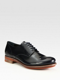 Bright contrast sole elevates the classic nature of this smooth leather lace-up.Leather upperLeather liningLeather soleMade in Italy Bright contrast sole elevates the classic nature of this smooth leather lace-up.Leather upperLeather liningLeather soleMade in Italy
