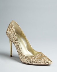 Glittering like champagne bubbles, these IVANKA TRUMP pumps are poised to be the toast of the town at any soiree. Glittering like champagne bubbles, these IVANKA TRUMP pumps are poised to be the toast of the town at any soiree.