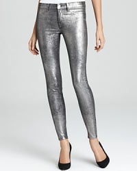 These coated metallic J Brand Jeans are the definitive rock-chic skinnies for fall--flaunt it in the most sought-after silhouette and color trend of the season. These coated metallic J Brand Jeans are the definitive rock-chic skinnies for fall--flaunt it in the most sought-after silhouette and color trend of the season.