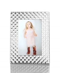 Cherish special memories for a lifetime with this picture frame from Martha Stewart Collection, featuring a lovely silver plated basket weave pattern. Cherish special memories for a lifetime with this picture frame from Martha Stewart Collection, featuring a lovely silver plated basket weave pattern.