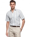 In a breezy short-sleeved style, this striped shirt from Tasso Elba redefines your casual wear. (Clearance)