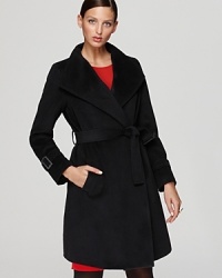 An essential for smart, sophisticated style, this Bloomingdale's exclusive Gerard Darel coat flaunts a classic silhouette and chic belt for a flattering, feminine fit. An essential for smart, sophisticated style, this Bloomingdale's exclusive Gerard Darel coat flaunts a classic silhouette and chic belt for a flattering, feminine fit.