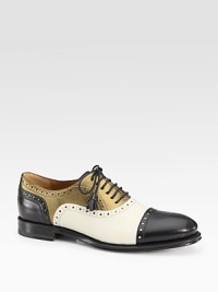 Oxford-inspired leather with metallic leather trim and tassel laces. Stacked heel, 1 (25mm)Nappa leather and metallic leather upperLeather lining and solePadded insoleMade in ItalyOUR FIT MODEL RECOMMENDS ordering one half size down as this style runs large. Oxford-inspired leather with metallic leather trim and tassel laces. Stacked heel, 1 (25mm)Nappa leather and metallic leather upperLeather lining and solePadded insoleMade in ItalyOUR FIT MODEL RECOMMENDS ordering one half size down as this style runs large.