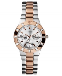 Covered in warm shine, this two-tone watch from GUESS glistens with crystal accents. Covered in warm shine, this two-tone watch from GUESS glistens with crystal accents.