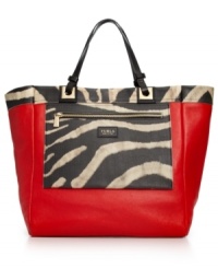Tap into the tribal trend with this cool colorblock shopper from Furla. Crafted from rich leather with luxe golden hardware; its spacious, reversible design makes it a major must-have. Tap into the tribal trend with this cool colorblock shopper from Furla. Crafted from rich leather with luxe golden hardware; its spacious, reversible design makes it a major must-have.
