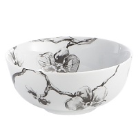 A captivating motif of lifelike orchids stands out in dramatic relief against a backdrop of vibrant white porcelain, giving this dinnerware from Michael Aram bold, artful presence. A captivating motif of lifelike orchids stands out in dramatic relief against a backdrop of vibrant white porcelain, giving this dinnerware from Michael Aram bold, artful presence.