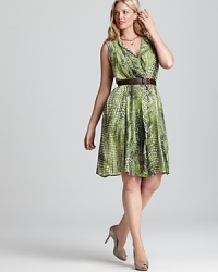 A vibrant exotic print enlivens a city-chic Jones New York Collection Plus dress. Team with raffia accents and style your way through the concrete jungle. A vibrant exotic print enlivens a city-chic Jones New York Collection Plus dress. Team with raffia accents and style your way through the concrete jungle.