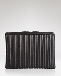 Padded for protection and featuring trapunto stitching inspired by sports car interiors, this quilted black calfskin folio makes a great host for your high-tech gear. Padded for protection and featuring trapunto stitching inspired by sports car interiors, this quilted black calfskin folio makes a great host for your high-tech gear.