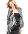 Wrap yourself in something wild with this fabulous zebra print wrap from Cejon. Soft and shimmery with a satiny feel, it makes any evening ensemble far more fierce.