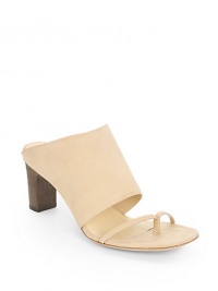 THE LOOKMule silhouetteSuede vamp and front toe straps Chunky wooden heelHeel 2½ (65mm)THE MATERIALLeather upperLeather lining and soleORIGINMade in Italy THE LOOKMule silhouetteSuede vamp and front toe straps Chunky wooden heelHeel 2½ (65mm)THE MATERIALLeather upperLeather lining and soleORIGINMade in Italy