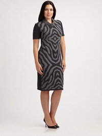 An undeniable head turner, this jersey dress features a zebra-print front. A touch of stretch ensures that you will love the way it fits you.Feminine necklineShort sleevesPrinted frontPull-on stylePrincess seams on backAbout 24 from natural waist95% wool/3% polyester/2% Lycra®Dry cleanMade in Italy An undeniable head turner, this jersey dress features a zebra-print front. A touch of stretch ensures that you will love the way it fits you.Feminine necklineShort sleevesPrinted frontPull-on stylePrincess seams on backAbout 24 from natural waist95% wool/3% polyester/2% Lycra®Dry cleanMade in Italy