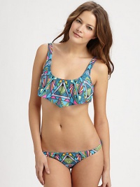 For those looking for a bit more coverage and support on top, this two-piece swim design offers just that. Wider straps for more supportSquare necklineRuffle detailBack clasp closureAllover printMinimal coverage, stretch bottom80% nylon/20% spandexHand washMade in USA