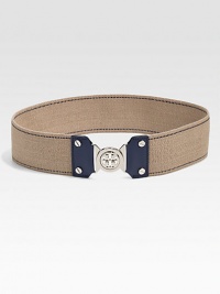 An elastic style with saffiano leather trim and an interlocking logo buckle. Width, about 2.2Made in USA An elastic style with saffiano leather trim and an interlocking logo buckle. Width, about 2.2Made in USA