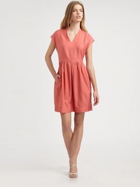 Flirty go-to fashioned with a v-neck, ruched waist, slash pockets and modern cap sleeves. V-neckCap sleevesRuched waistbandSlash pocketsSide zipperAbout 20 from natural waist67% cupro/33% cottonDry cleanMade in USA of imported fabricModel shown is 5'10 (177cm) wearing US size 4. Flirty go-to fashioned with a v-neck, ruched waist, slash pockets and modern cap sleeves. V-neckCap sleevesRuched waistbandSlash pocketsSide zipperAbout 20 from natural waist67% cupro/33% cottonDry cleanMade in USA of imported fabricModel shown is 5'10 (177cm) wearing US size 4.