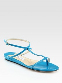 Glossy patent leather straps intersect on this classic, easy-going shape. Patent leather upperAdjustable ankle strapLeather lining and solePadded insoleMade in Italy Glossy patent leather straps intersect on this classic, easy-going shape. Patent leather upperAdjustable ankle strapLeather lining and solePadded insoleMade in Italy