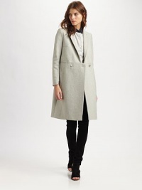 Double-breasted, wool-rich coat styled with a notched shawl collar, back vent and strategically placed front besom pockets. Notched shawl collarButton frontLong sleeves with zippered cuffsFront besom pocketsBack ventAbout 37 from shoulder to hem80% wool/20% polyamideDry cleanImportedModel shown is 5'10 (177cm) wearing US size 4. Double-breasted, wool-rich coat styled with a notched shawl collar, back vent and strategically placed front besom pockets. Notched shawl collarButton frontLong sleeves with zippered cuffsFront besom pocketsBack ventAbout 37 from shoulder to hem80% wool/20% polyamideDry cleanImportedModel shown is 5'10 (177cm) wearing US size 4.