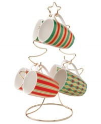 Enjoy hot drinks in a holiday setting with the Festive Yuletide mug set. Six mugs with cheery patterns hang from metal branches in a tree-shaped stand. Enjoy hot drinks in a holiday setting with the Festive Yuletide mug set. Six mugs with cheery patterns hang from metal branches in a tree-shaped stand.