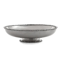 Marked by the incredible handcrafting that the Molten motif is known for, this small footed platter is embellished with countless molten beads carefully placed by a highly skilled artisan. The look is streamlined, timeless, organic and soulful. Marked by the incredible handcrafting that the Molten motif is known for, this small footed platter is embellished with countless molten beads carefully placed by a highly skilled artisan. The look is streamlined, timeless, organic and soulful.
