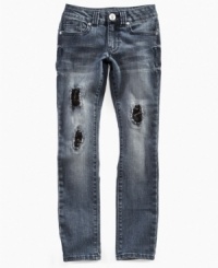 Grunge meets glam in these distressed Guess jeans styled with tears, sequins and attitude. Grunge meets glam in these distressed Guess jeans styled with tears, sequins and attitude.