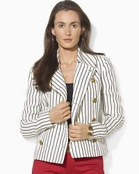 A classic double-breasted silhouette rendered in luxurious, richly textured cotton gets a nautical-inspired update with chic bold stripes. A classic double-breasted silhouette rendered in luxurious, richly textured cotton gets a nautical-inspired update with chic bold stripes.