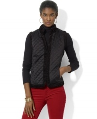 Lauren Ralph Lauren's luxurious quilted satin vest reverses to a plush faux-shearling side, doubling the glamorous wardrobe-styling options for the modern woman. Lauren Ralph Lauren's luxurious quilted satin vest reverses to a plush faux-shearling side, doubling the glamorous wardrobe-styling options for the modern woman.