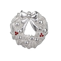 Gleaming in polished silver plate, this sculptural ornament is detailed with twinkling crystal stones for a look that's festive and traditional. Gleaming in polished silver plate, this sculptural ornament is detailed with twinkling crystal stones for a look that's festive and traditional.