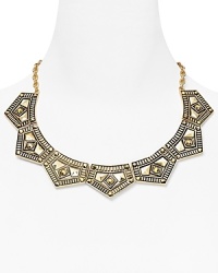 Belle Noel channels gypsy glamor with this plated collar necklace, cast in yellow gold with ornately engraved geometric stations. It's statement style for the Boho trope. Belle Noel channels gypsy glamor with this plated collar necklace, cast in yellow gold with ornately engraved geometric stations. It's statement style for the Boho trope.