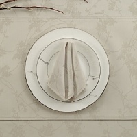 Cotton table mat embellished with an earthy flair of sprigs allover. This place setting is suitable for refined entertaining. Cotton table mat embellished with an earthy flair of sprigs allover. This place setting is suitable for refined entertaining.
