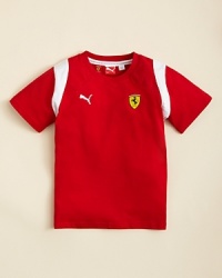 PUMA's crewneck tee is updated with stitched panels and contrast bands at the shoulder, finished with logo patches and embroidery detail at the chest. PUMA's crewneck tee is updated with stitched panels and contrast bands at the shoulder, finished with logo patches and embroidery detail at the chest.