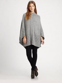 EXCLUSIVELY AT SAKS.COM. Wool-rich cape with intricate open-knit trim is a lesson in casual elegance. Ribbed funnelneckButton frontLong cape sleevesAbout 33 from shoulder to hemWool/viscose/polyesterDry cleanImported of Italian fabricSIZE & FITModel shown is 5'10 (177cm) wearing US size Small.This style runs large. We recommend ordering one size down for a standard fit. 