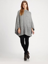 EXCLUSIVELY AT SAKS.COM. Wool-rich cape with intricate open-knit trim is a lesson in casual elegance. Ribbed funnelneckButton frontLong cape sleevesAbout 33 from shoulder to hemWool/viscose/polyesterDry cleanImported of Italian fabricSIZE & FITModel shown is 5'10 (177cm) wearing US size Small.This style runs large. We recommend ordering one size down for a standard fit. EXCLUSIVELY AT SAKS.COM. Wool-rich cape with intricate open-knit trim is a lesson in casual elegance. Ribbed funnelneckButton frontLong cape sleevesAbout 33 from shoulder to hemWool/viscose/polyesterDry cleanImported of Italian fabricSIZE & FITModel shown is 5'10 (177cm) wearing US size Small.This style runs large. We recommend ordering one size down for a standard fit.