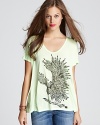 A fierce eagle graphic, with arrow-tipped feathers, emboldens this Lauren Moshi tee with cutting-edge style.