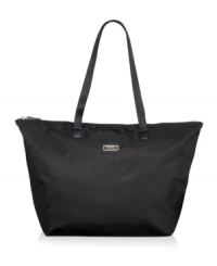 The ideal tag-along! Folding neatly into its own pouch with wristlet, this everyday companion goes everywhere with room for all your daily essentials and must-haves. The sophisticated nylon exterior with leather trim has a back sleeve that easily fits over extended luggage handles for the ultimate in versatility. Five-year warranty. The ideal tag-along! Folding neatly into its own pouch with wristlet, this everyday companion goes everywhere with room for all your daily essentials and must-haves. The sophisticated nylon exterior with leather trim has a back sleeve that easily fits over extended luggage handles for the ultimate in versatility. Five-year warranty.