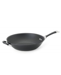 Causing quite a stir for chef's everywhere! High sides and a deep shape make the perfect place to toss around your favorite veggies for unforgettable stir fry made to perfection. Constructed for superior performance with a hard-anodized construction, impact-bonded stainless steel base and dishwasher-safe finish. Lifetime warranty. Causing quite a stir for chef's everywhere! High sides and a deep shape make the perfect place to toss around your favorite veggies for unforgettable stir fry made to perfection. Constructed for superior performance with a hard-anodized construction, impact-bonded stainless steel base and dishwasher-safe finish. Lifetime warranty.