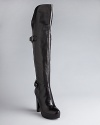 Look hot when the weather cools down in sensational over the knee platform boots from GUESS.